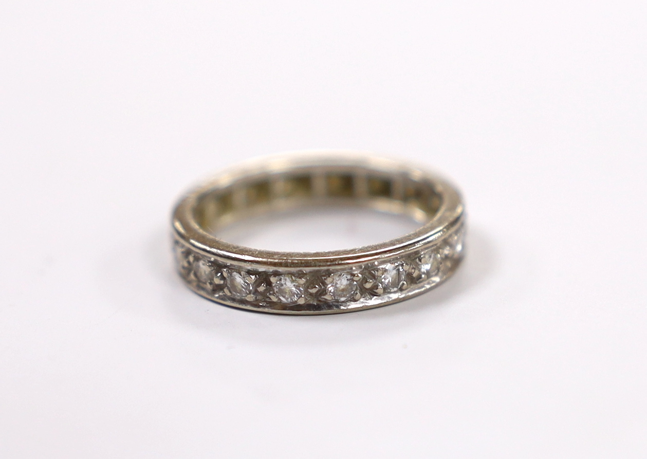 A 1970's 18ct white gold and diamond set full eternity ring, size N, gross weight 4.6 grams.
